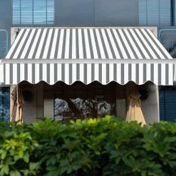 GOPLUS Store Banne Auvent Manuel Rétractable Avec Manivelle En Aluminium Et Polyester, Imperméable, Résistant Aux UV, Pour Terrasse, Bistro, Balcon, Imperméable,300X250CM (Gris-Blanc) 10 GOPLUS Store Banne Auvent Manuel Rétractable Avec Manivelle En Aluminium Et Polyester, Imperméable, Résistant Aux UV, Pour Terrasse, Bistro, Balcon, Imperméable,300X250CM (Gris-Blanc) -Pergola Soldes 40251910 4